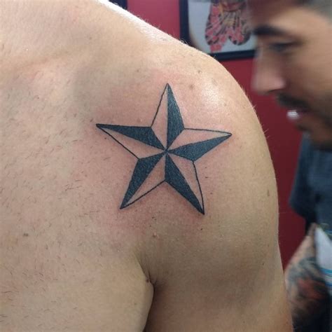 star tattoo on shoulder meaning|Meaning Behind Star Tattoos on Shoulders: A Celestial Journey